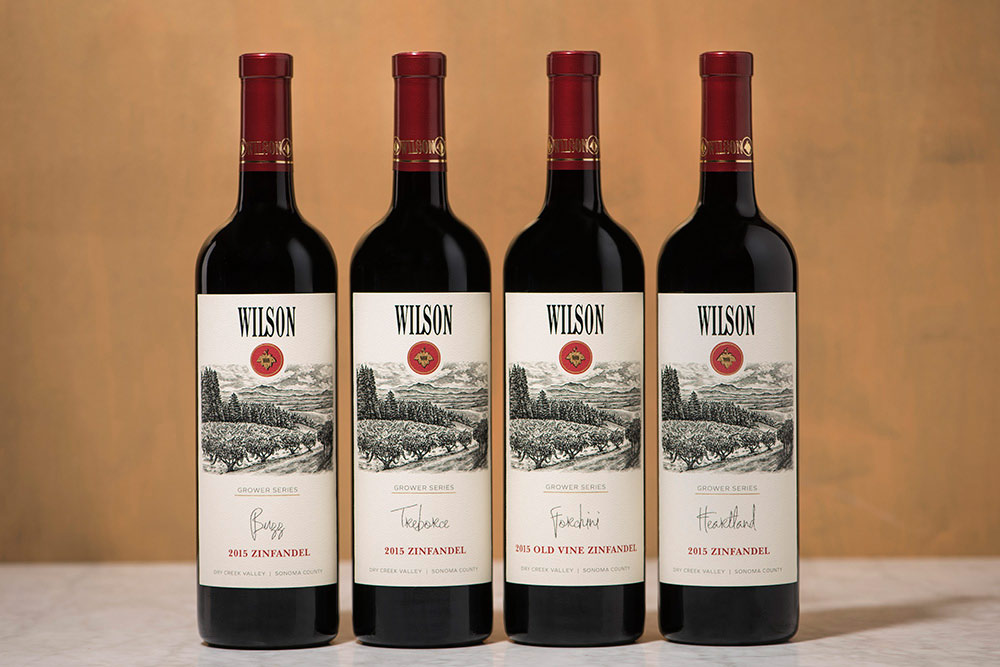 4 bottles of Wilson Wine on a Table Image